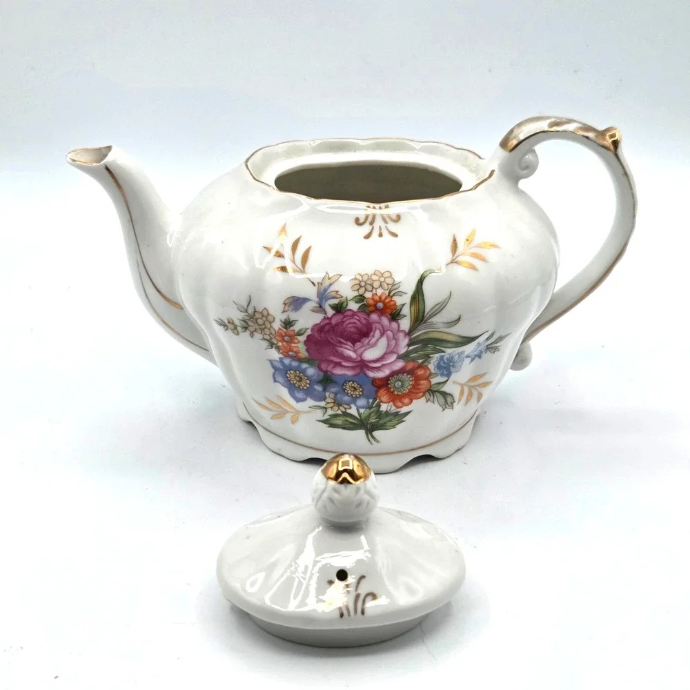 Porcelain Musical Teapot Plays 